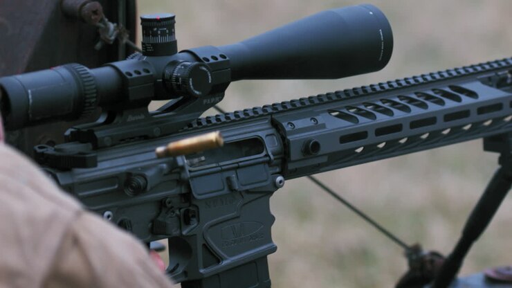 A man fires off his rifle