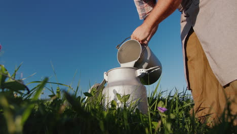 man pours milk into a can