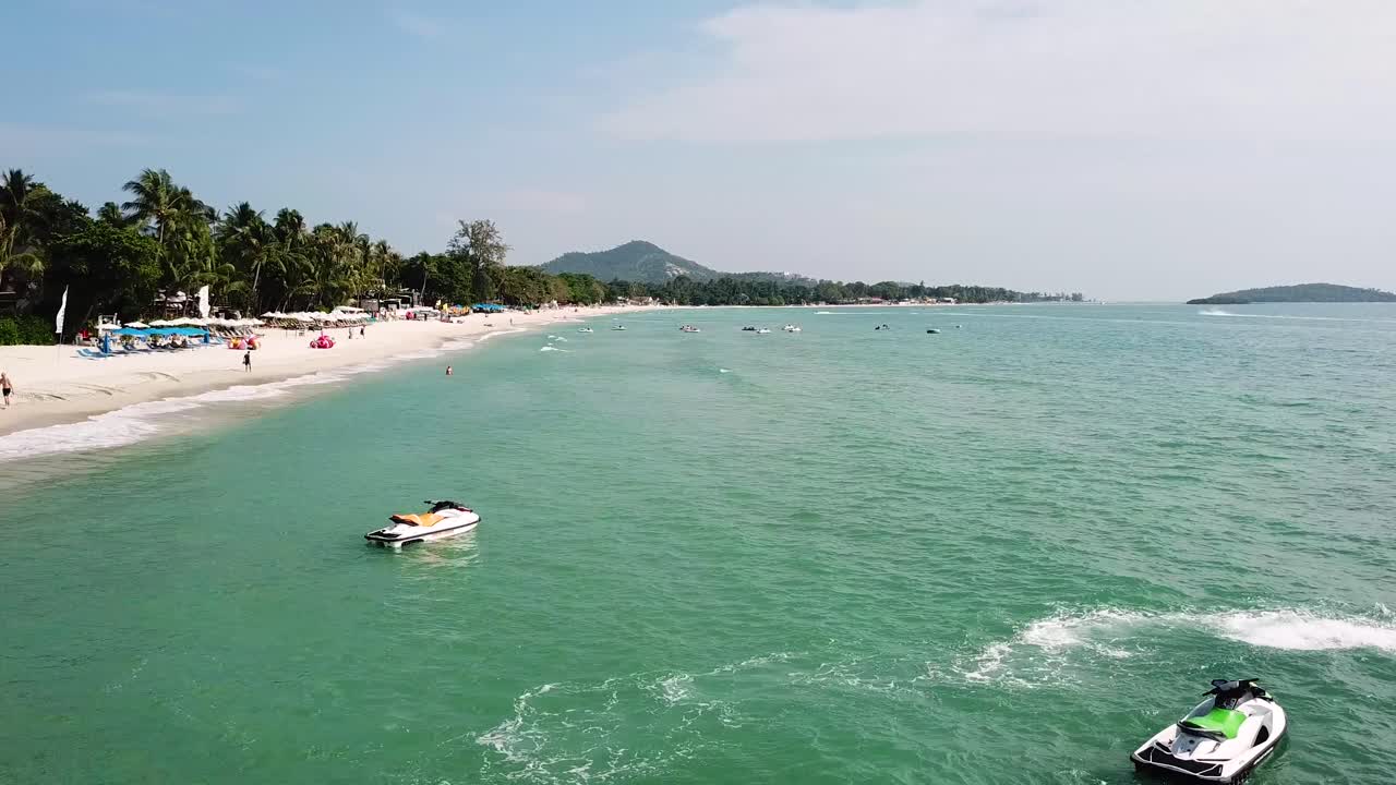 Tropical Beach with Jet Skis