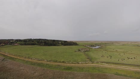 Aerial-drone-footage-of-Cley-Next-To-Sea,-and-the-surrounding-scenery,-Norfolk