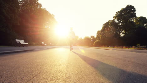 Road-runner-woman-running-in-park-in-the-morning-motion-track-high-definition-video