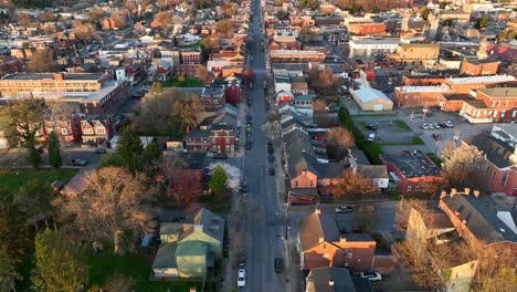 slow upward tilt view of a large city in the spring, featuring the quietness of small town america
