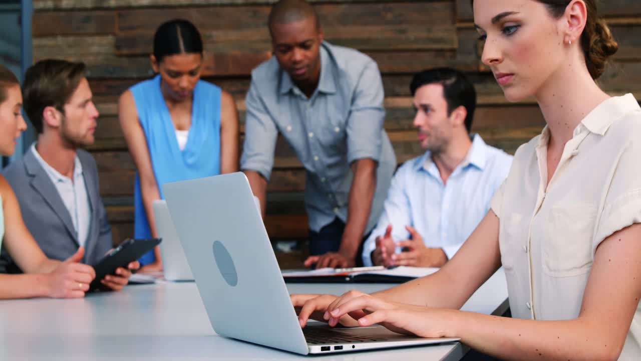 Business executive working on laptop