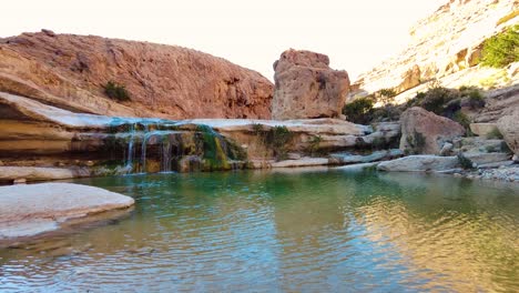 a waterfall in the middle of the sahara desert algeria biskra