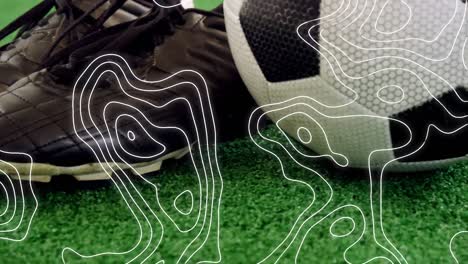 Animation-of-white-lines-moving-over-soccer-ball-and-shoes
