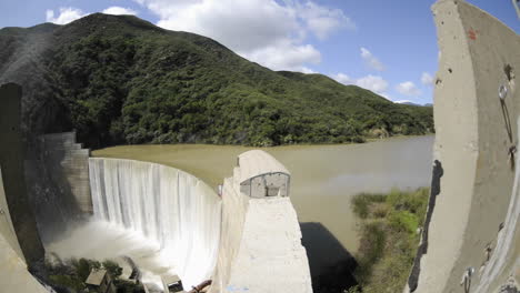 Wide-time-lapse-dolly-shot-from-above-Matilija-Creek-spilling-over-an-obsolete-Matilija-Dam-3