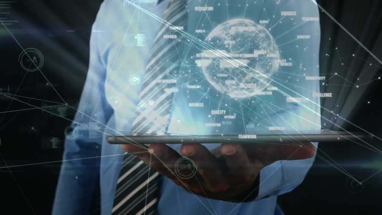 Animation of data processing over african american businessman using tablet