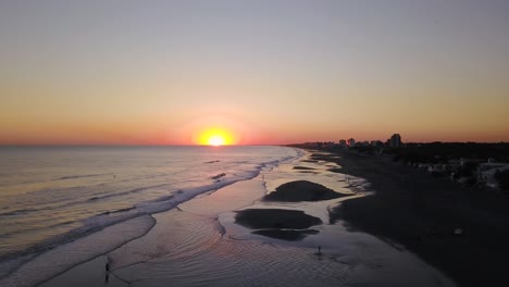 idyllic sunset beach in monte hermoso, argentina - aerial drone shot