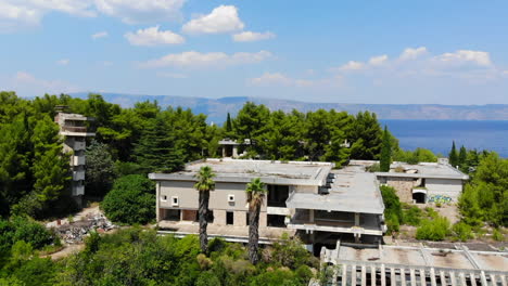 aerial drone shot of an old hotel in jelsa on the island of hvar, croatia