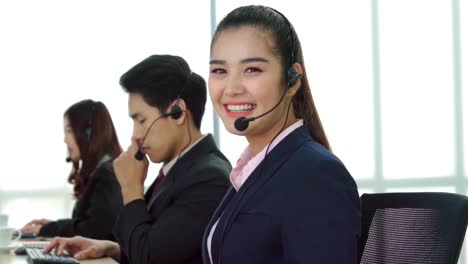 Business-people-wearing-headset-working-in-office