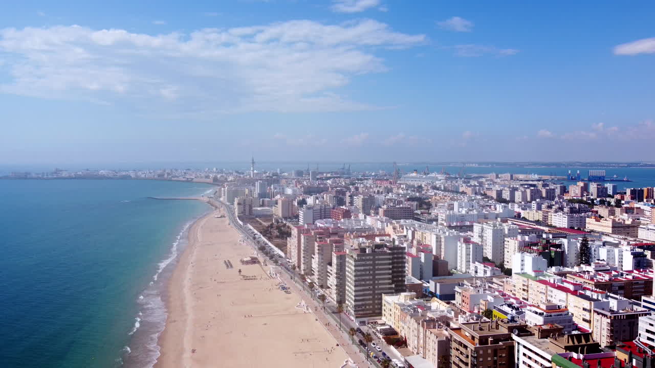 Cadiz City and Beach Aerial Cityscape Pullback on a Sunny Summer's Day