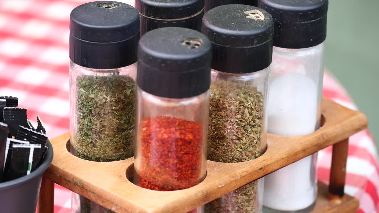 Spice Jars on a Wooden Rack