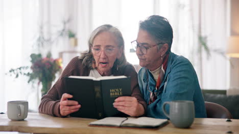 elderly women reading the bible together