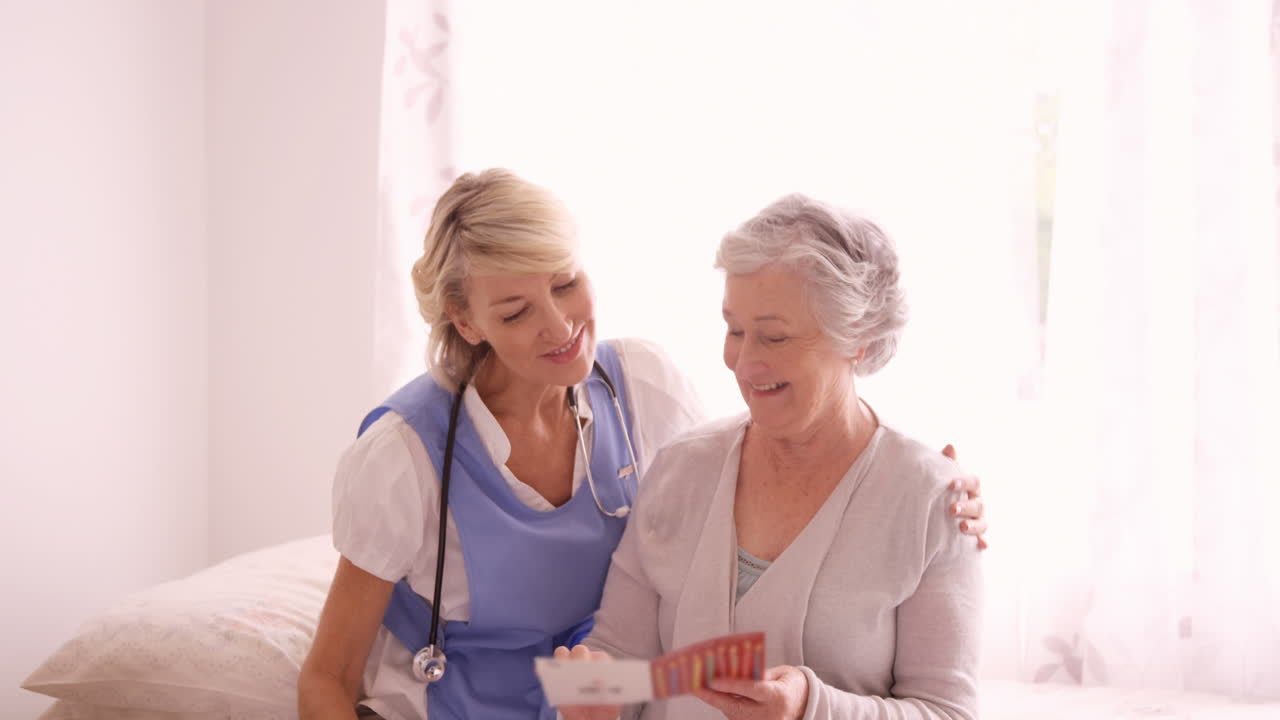 Female doctor greeting to senior woman