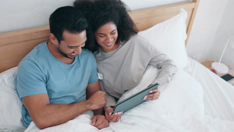 tablet, video and laughing with a couple in bed