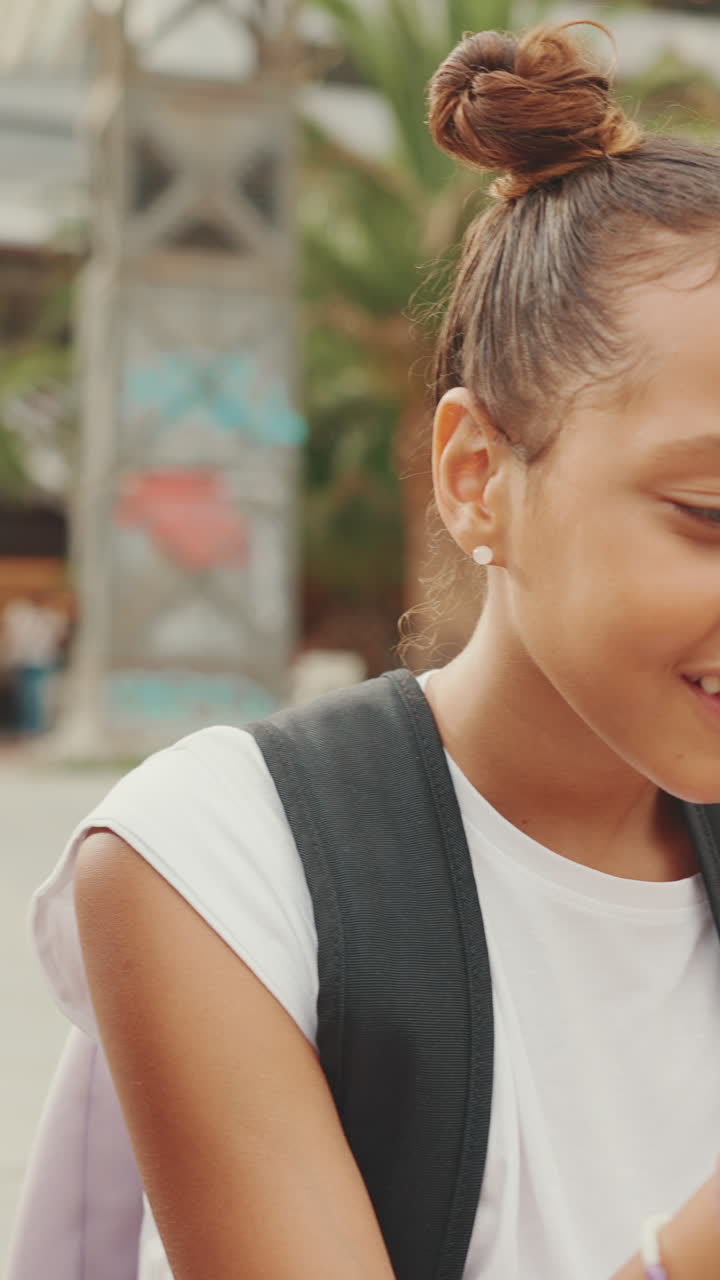 Teenagers using smartphone outdoors