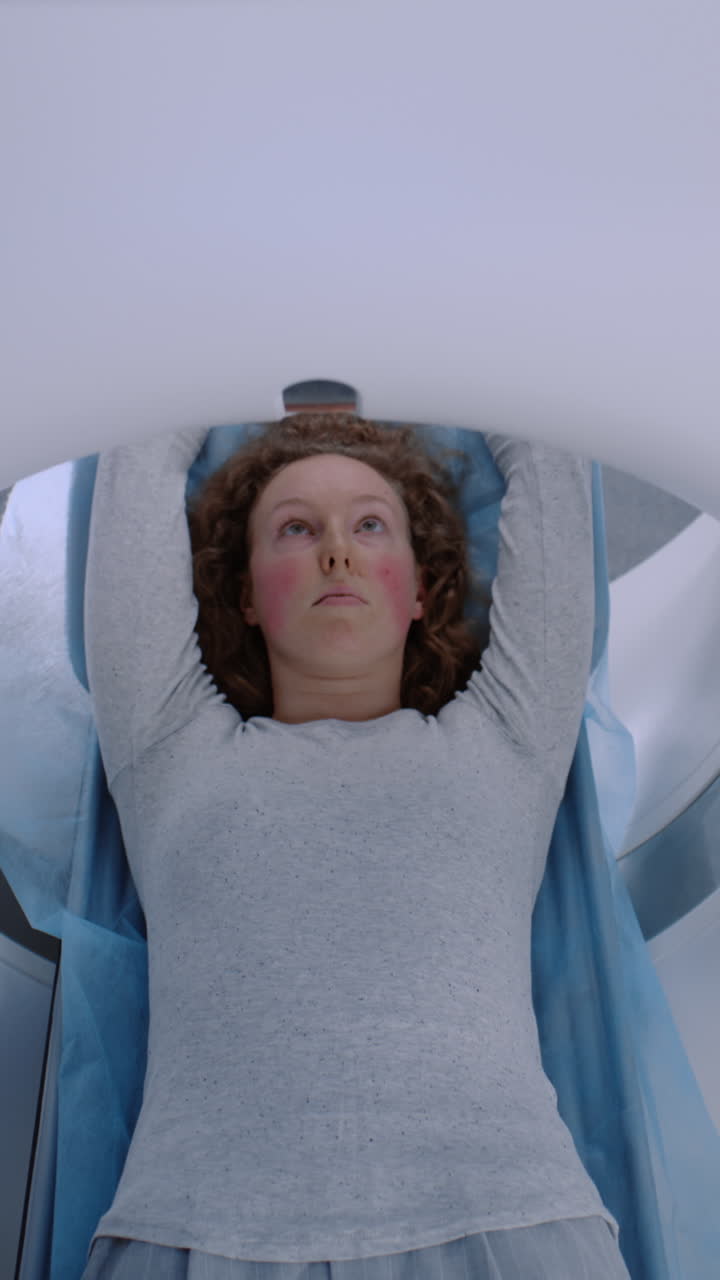 Woman undergoing medical scan in hospital