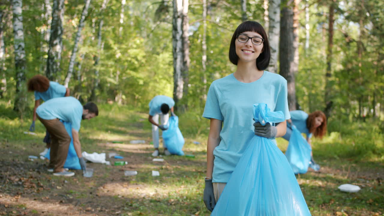 Community Volunteers Cleaning Up a Forest
