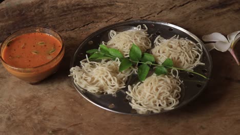 idiyappam rice noodle indian food  on wood background