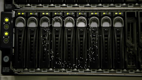 data processing animation over server rack with blinking lights in data center