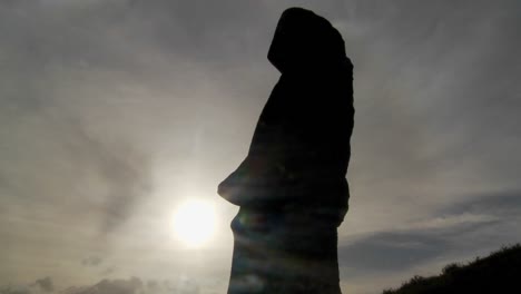 clouds move behind easter island statues 2