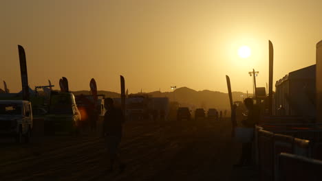 dakar rally main camp street activity at sunrise