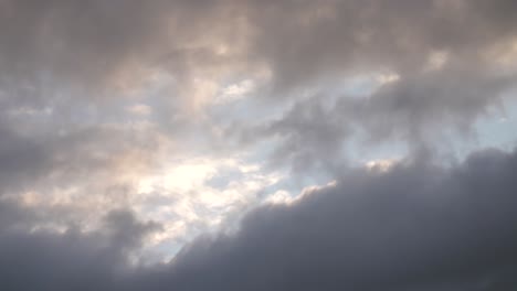 timelapse of rainy clouds in the sky that sweeps past