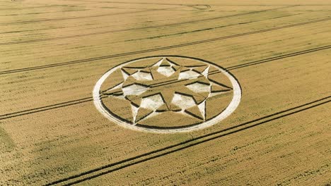 crop circle in field in marten, wiltshire, uk - aerial drone shot