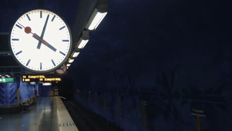 modern metro train arriving to the station