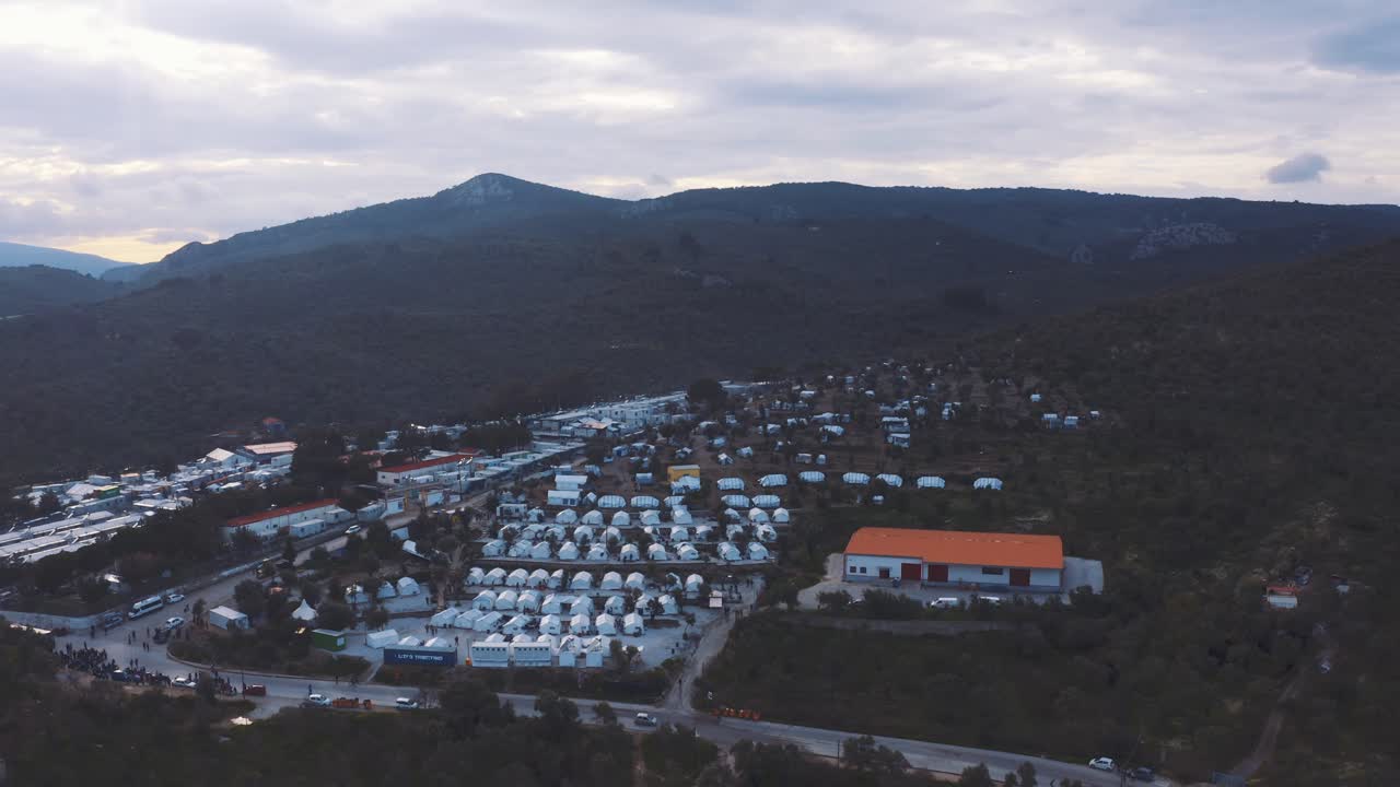 Aerial View Over Moria Refugee Camp In Greece. High Angle, Pan Down