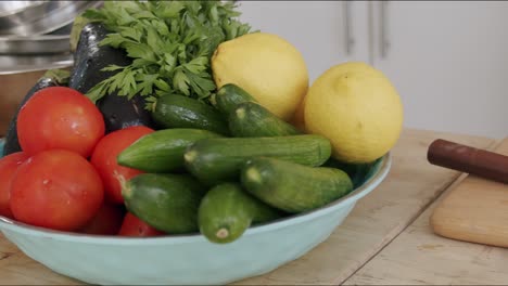 slide shot of a bowl full of fruits, with a chef in the background,
shot at 100fps 2