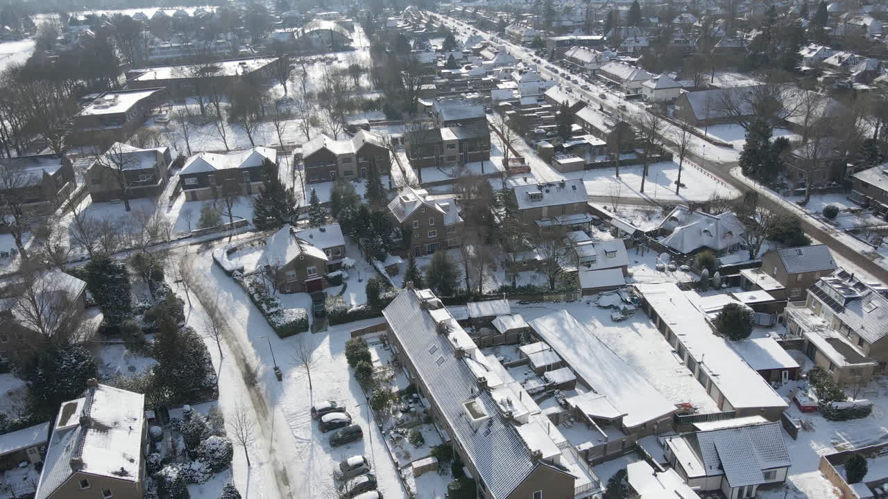 Beautiful aerial of suburban neighbourhood covered in snow