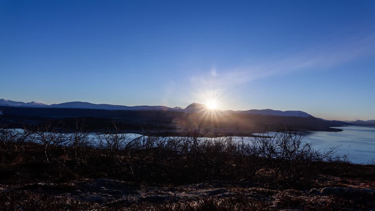The sun rising over Tromsø in northern norway during autumn