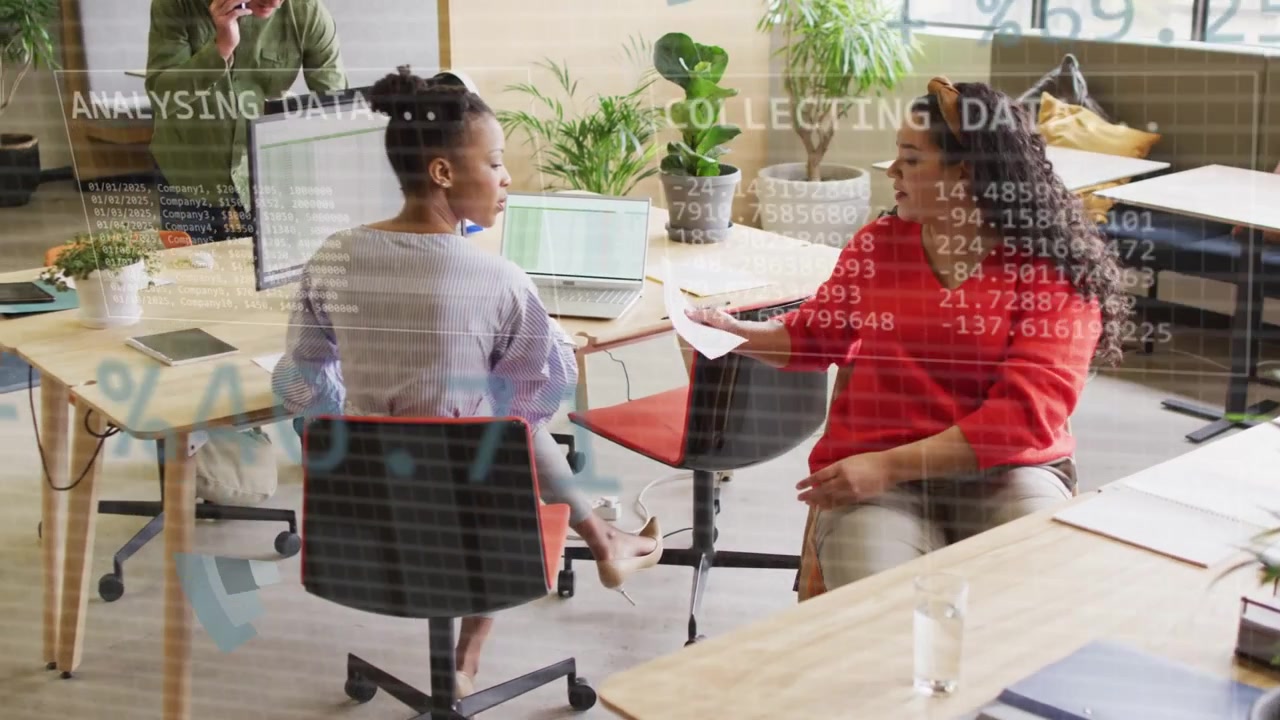 Woman in red handing paper to seated analyst at laptop, animated charts highlighting data analysis