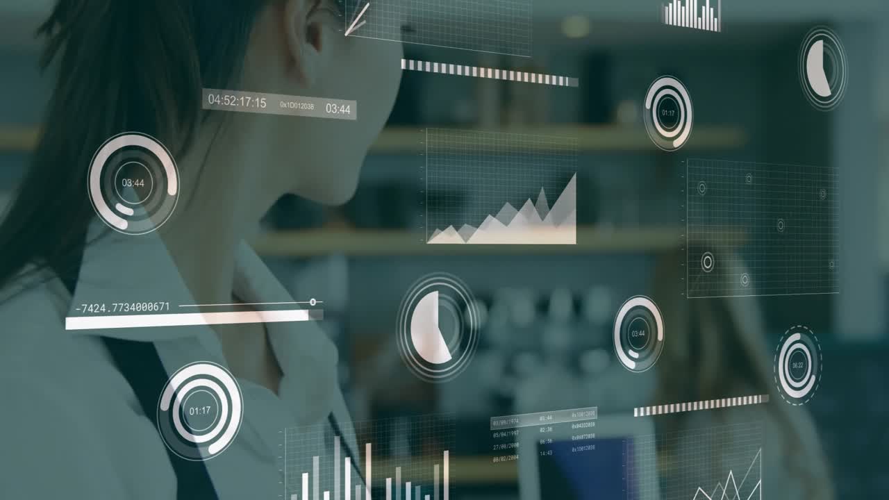 Woman manipulating holographic charts and numeric readouts on transparent display in tech workspace