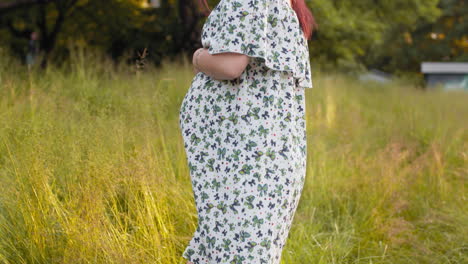 pregnant woman in a field