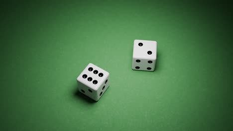 dice on a green tabletop