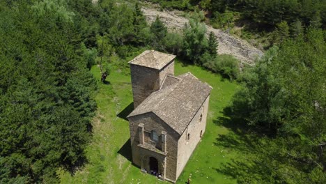 aerial circular drone view of a mountain church