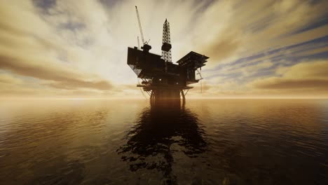 offshore jack up rig in the middle of the sea at sunset time