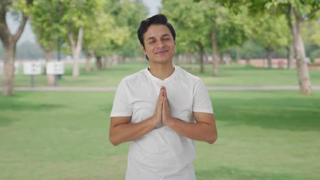 Happy-Indian-man-doing-Namaste