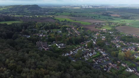 Aerial-view-above-Cheshire-North-England-viewpoint-out-across-Snowdonia-North-Wales-vast-countryside-slow-orbit-right