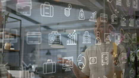 animation of business icons and data processing over african american businesswoman in office