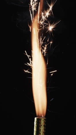 Vertical video of lit torch and copy space on black background