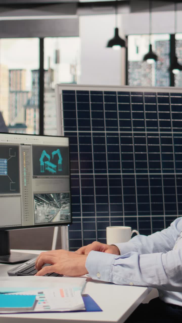 Portrait of happy sustainable energy researcher using simulation software