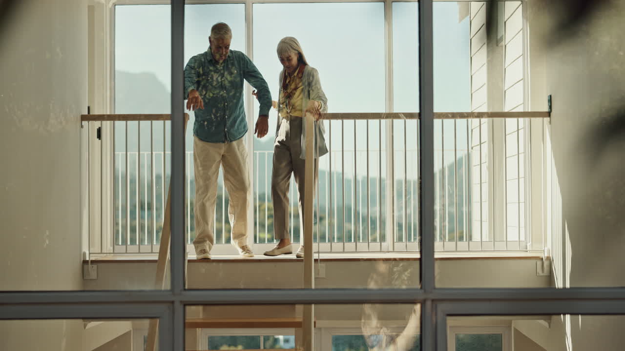 Senior couple embracing at home