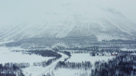 Aerial-Drone-view-of-Dramatic-Wintery-Landscape-above-the-Arctic-Circle-in-Norway