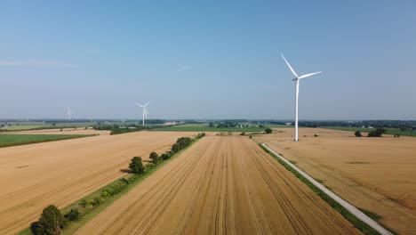 beautiful windmill landscape reveal contrasted next to beautiful farm land