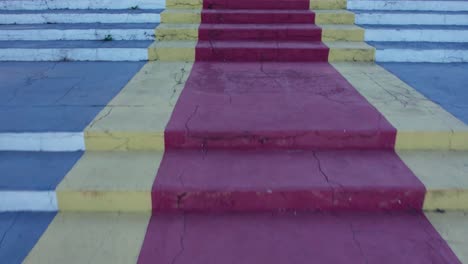 camera fast movement over marble steps in front of a church