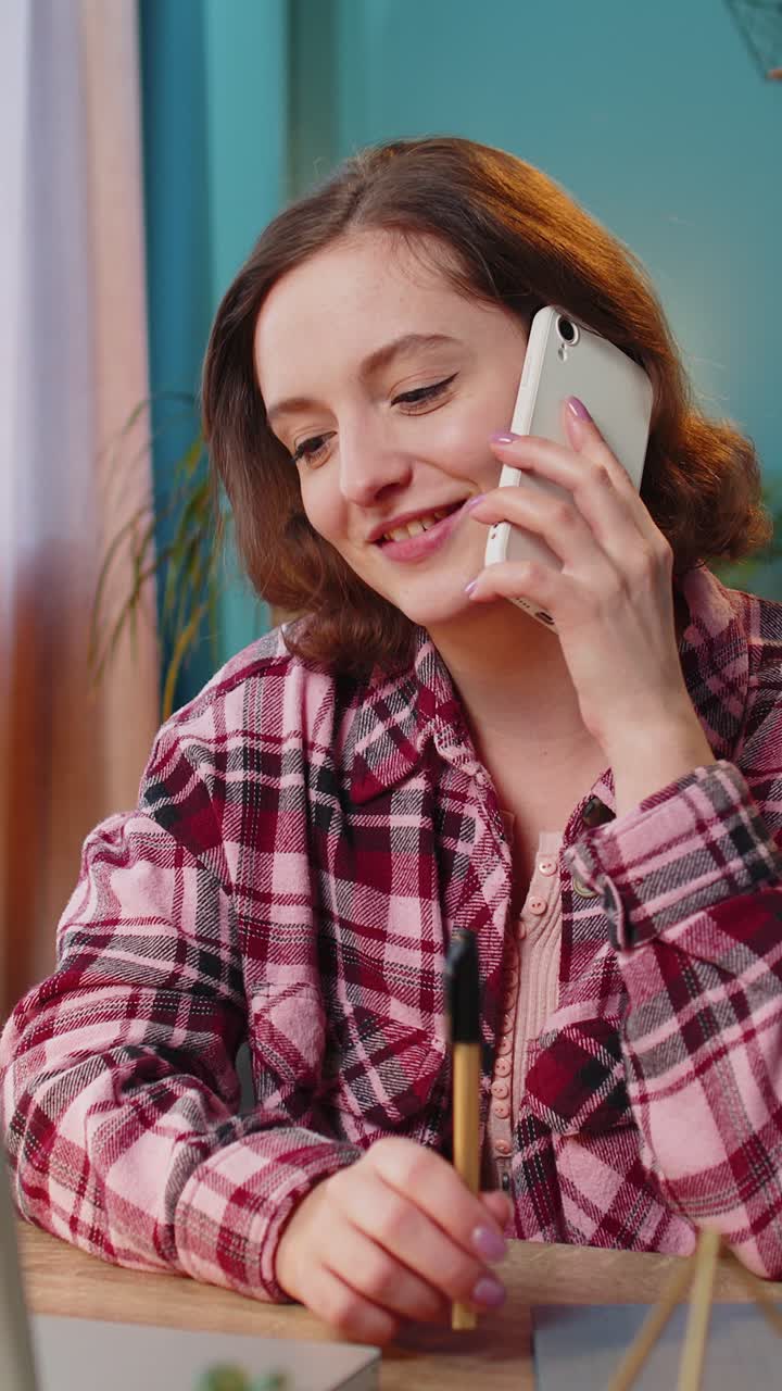 Business woman freelancer answering to client on mobile phone call using smartphone conversation