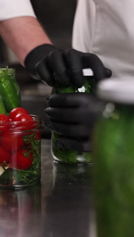 chef preserving cucumbers